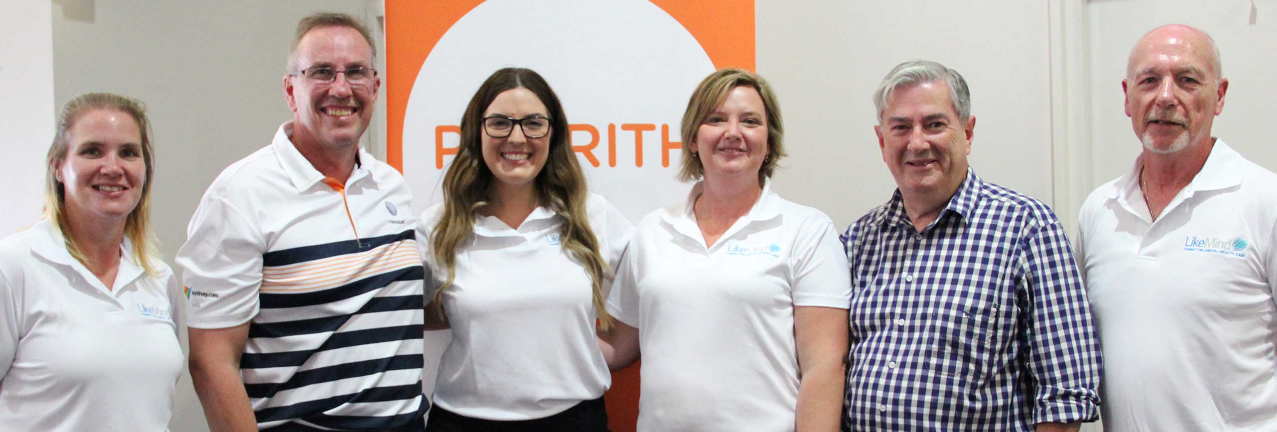 Penrith Council’s General Manager Warwick Winn (second from left) and Mayor Ross Fowler OAM (second from right) with community and health service staff from LikeMind.