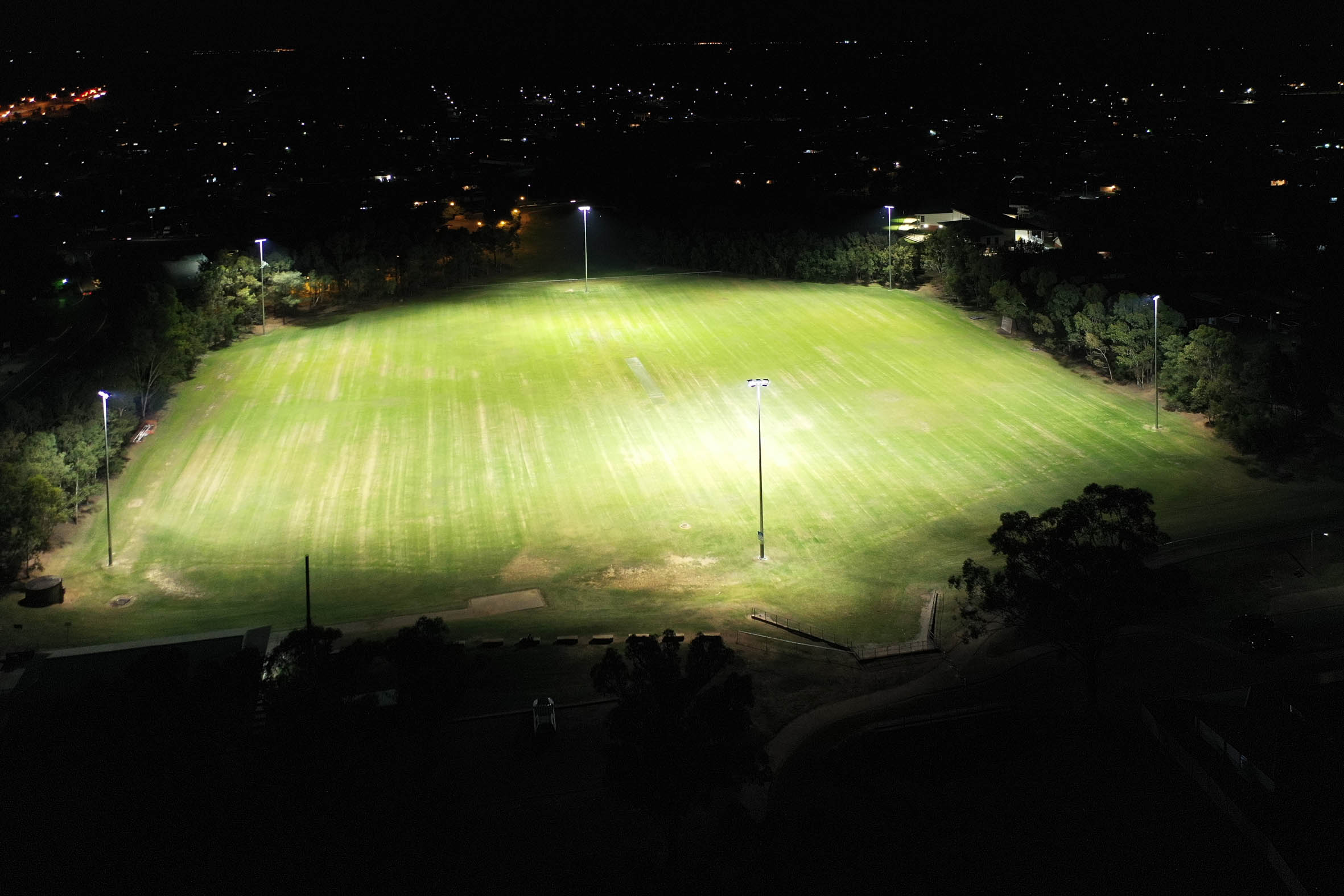 Myrtle Road Reserve lit up at night.