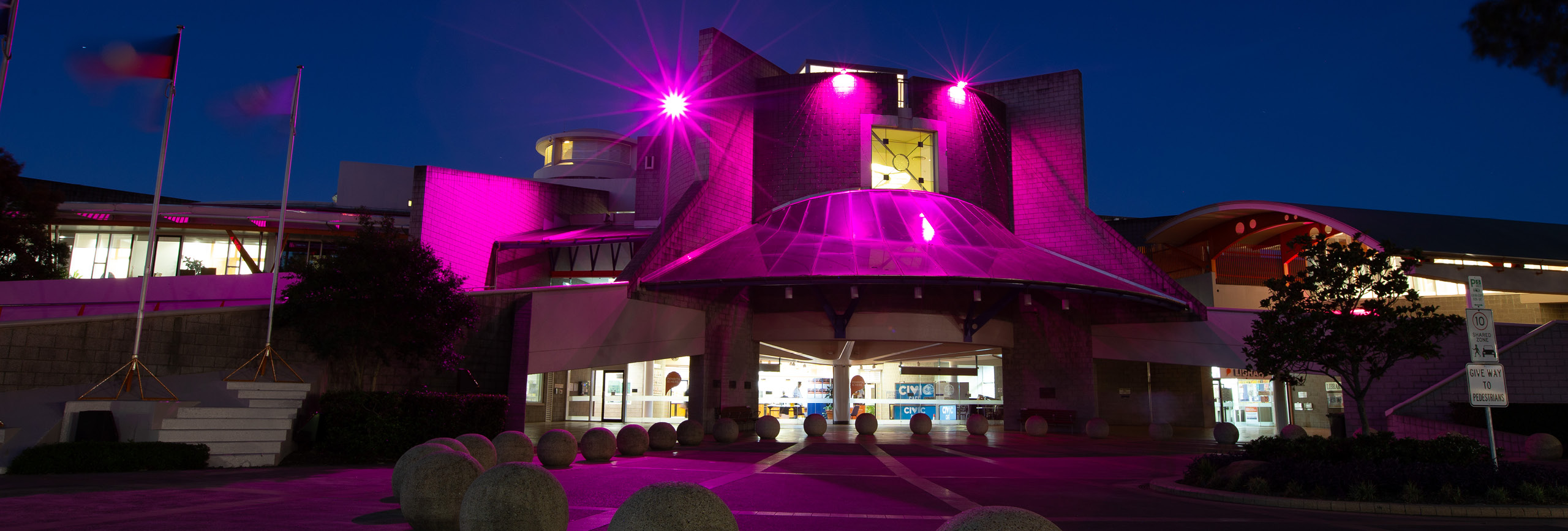 Pink lights on the Civic Centre as part of Pink Up Penrith