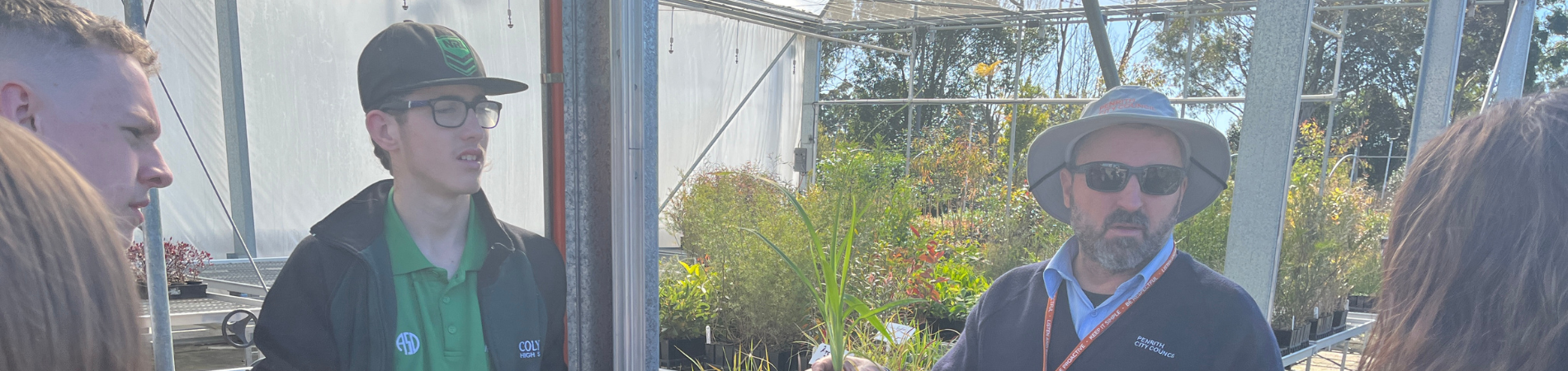 Council’s Nursery Coordinator, Mark Viler, speaks to Colyton High School students about different types of plant species during their visit to the Nursery.