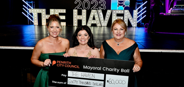 Penrith Mayor Tricia Hitchen (right) presents The Haven a cheque for $60,000.