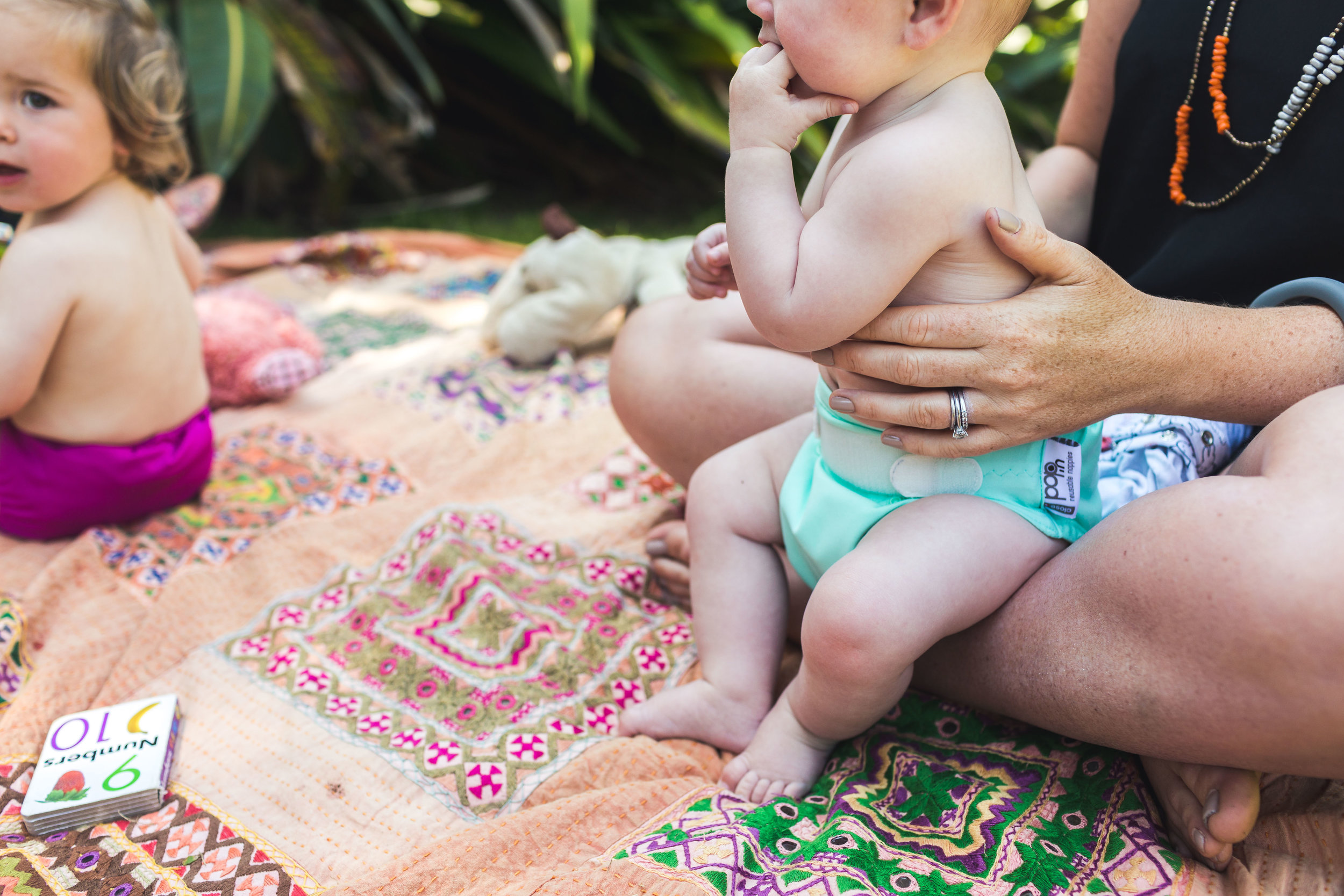 Baby wearing cloth nappy