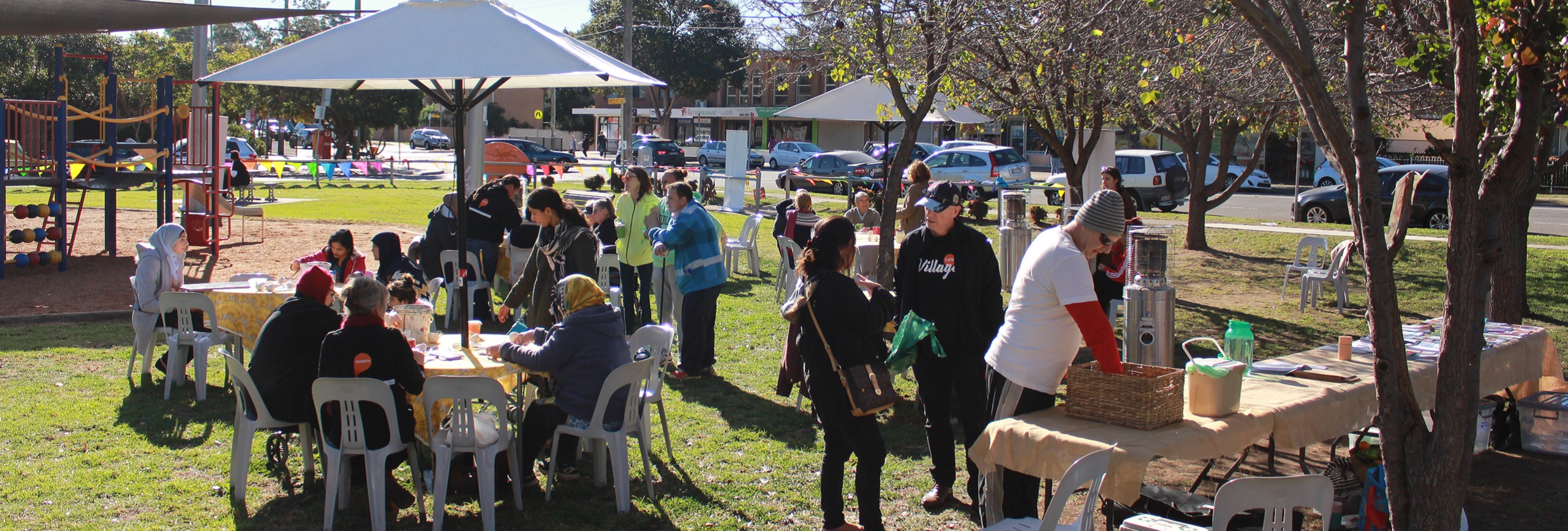 Group of people at outdoor cafe in park