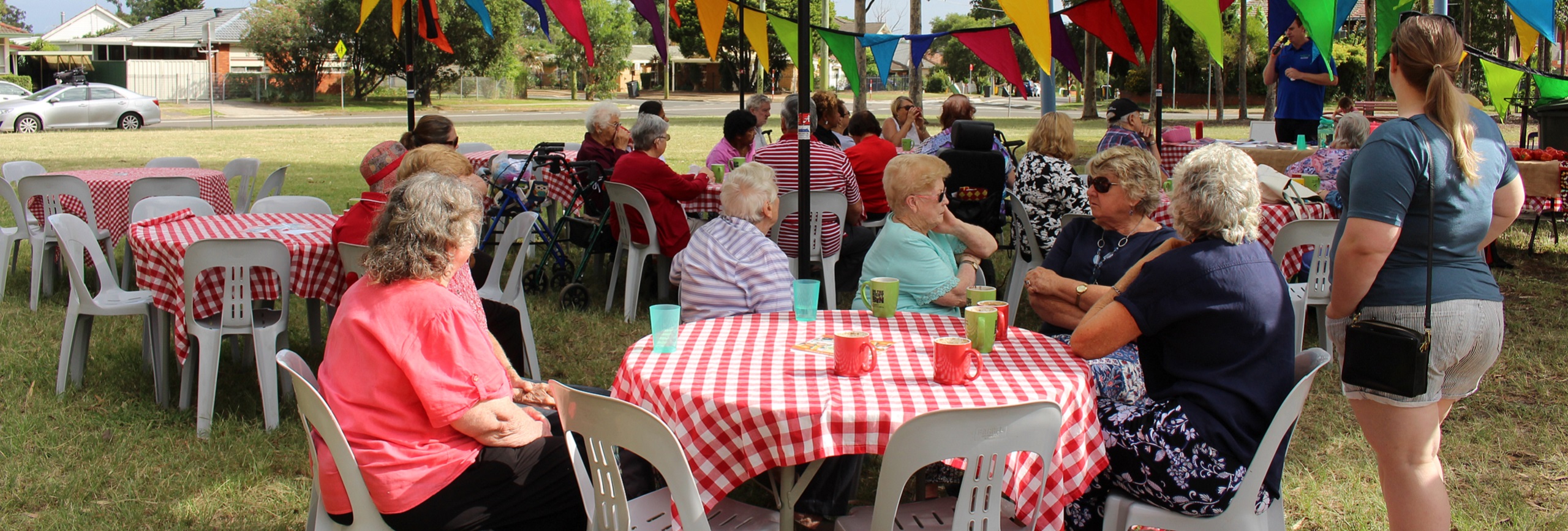 Group of people at outdoor cafe in park