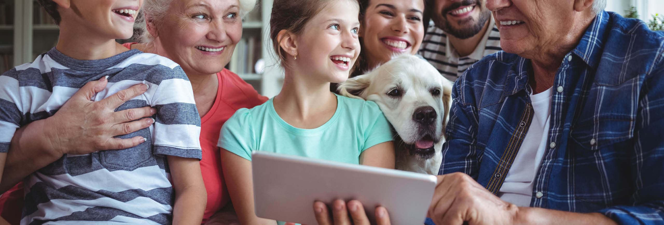 Family looking at technology.