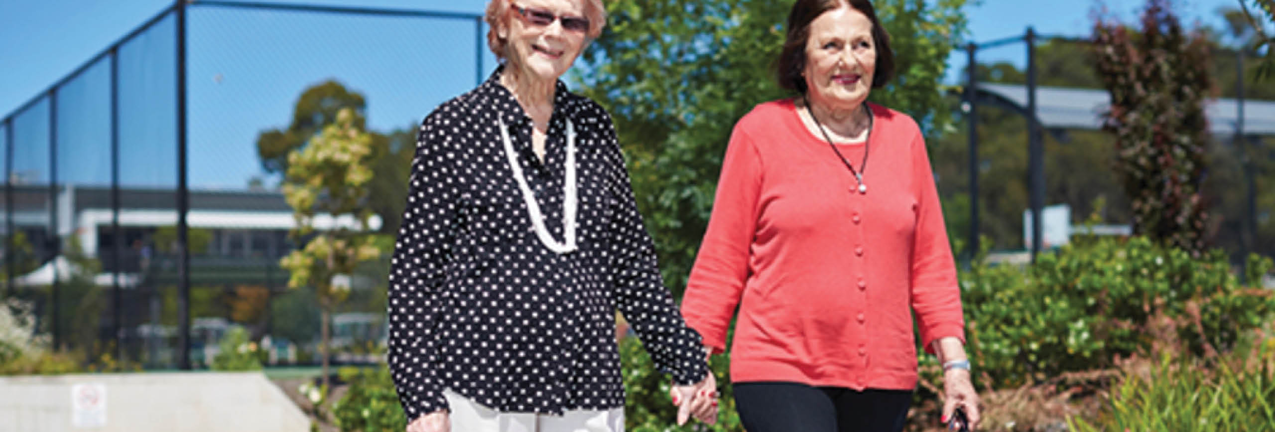 Two women walking.