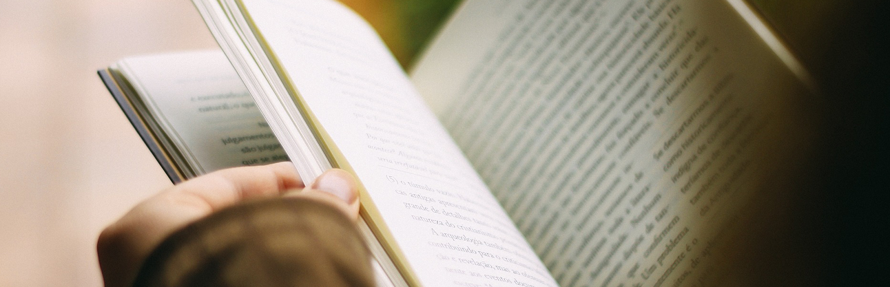 A close-up of the pages of an open book.