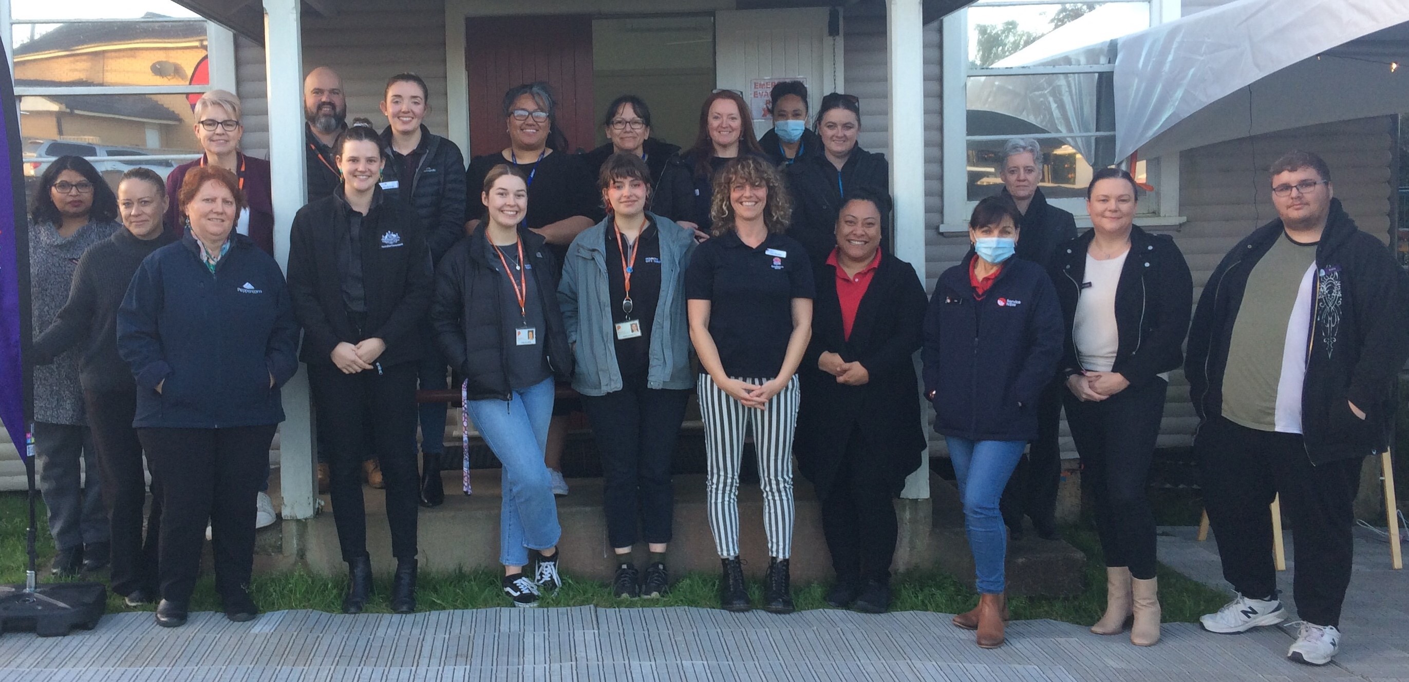 Image showing recovery hub team members standing together as a group at the recovery hub